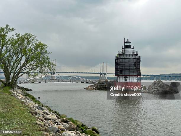 restoration of the tarrytown lighthouse also know as the sleepy hollow lighthouse. - tarrytown stock pictures, royalty-free photos & images