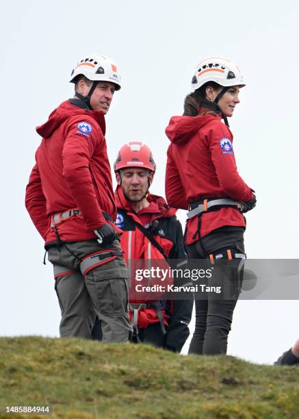 Catherine, Princess of Wales and Prince William, Prince of Wales take part in abseiling as part of training activities during a visit to Central...