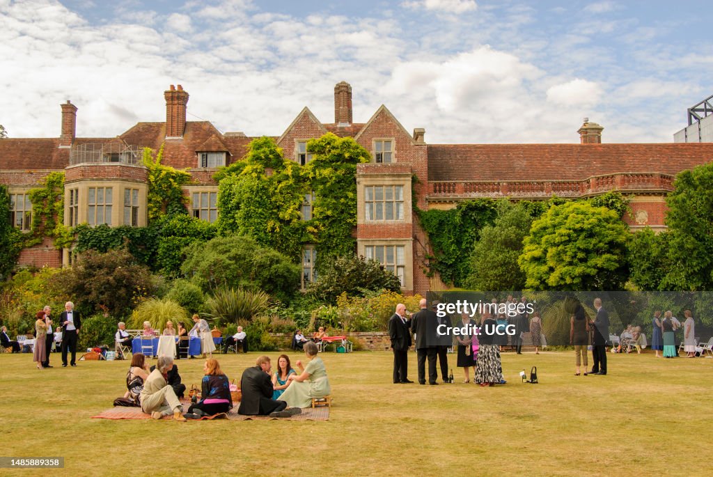 People on the lawn at Glyndebourne in England