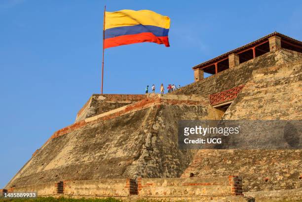Colombian flag over the Castillo de San Felipe de Barajas, Cartagena de Indias, Colombia.