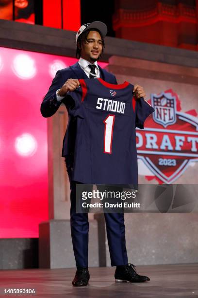 Stroud poses after being selected second overall by the Houston Texans during the first round of the 2023 NFL Draft at Union Station on April 27,...