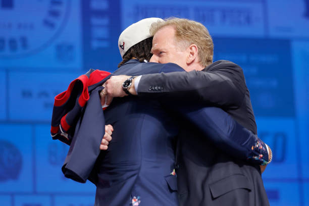 Stroud hugs NFL Commissioner Roger Goodell after being selected second overall by the Houston Texans during the first round of the 2023 NFL Draft at...