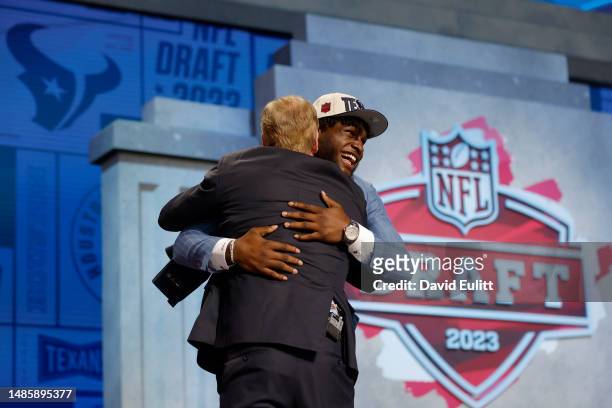 Will Anderson Jr. Hugs with NFL Commissioner Roger Goodell after being selected third overall by the Houston Texans during the first round of the...