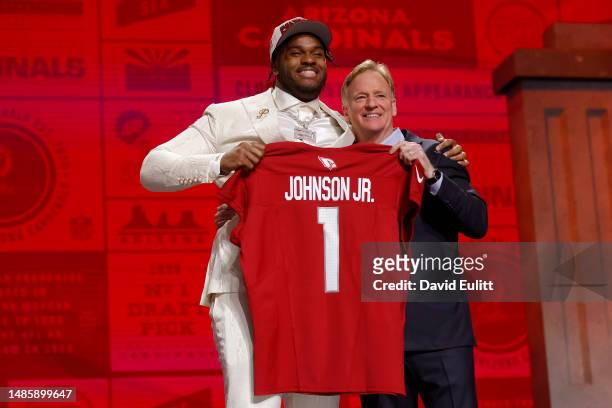 Paris Johnson Jr. Poses with NFL Commissioner Roger Goodell after being selected sixth overall by the Arizona Cardinals during the first round of the...