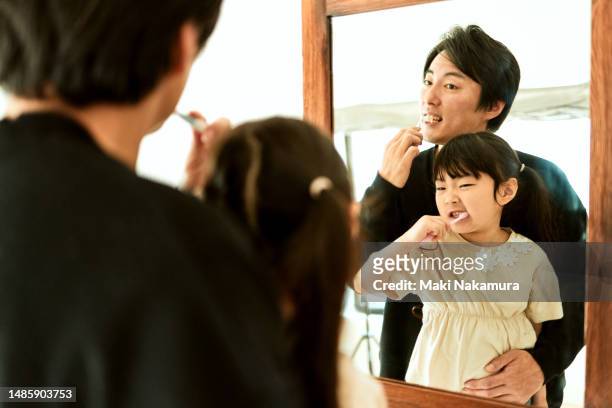 father and daughter morning - buccal cavity stock pictures, royalty-free photos & images