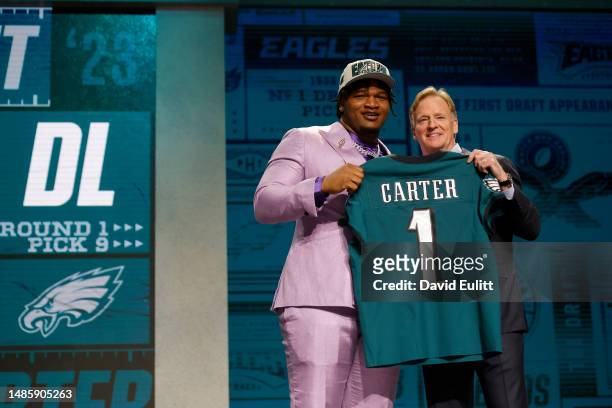 Jalen Carter poses with NFL Commissioner Roger Goodell after being selected ninth overall by the Philadelphia Eagles during the first round of the...