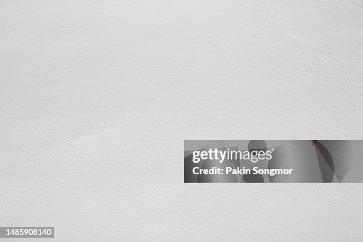 White color with an old grunge wall concrete texture as a background. White color with an old grunge wall concrete texture as a background.