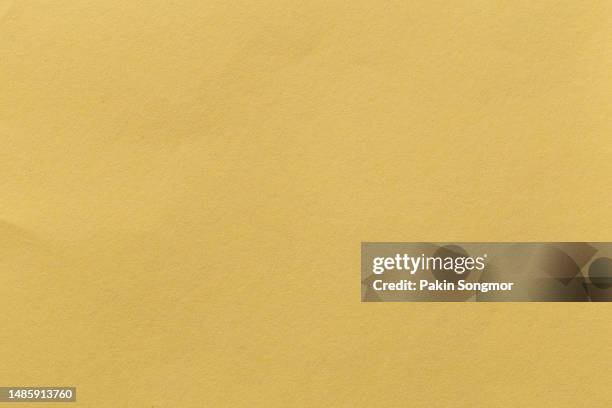 khaki paper sheet texture cardboard background. - khaki texture stock pictures, royalty-free photos & images