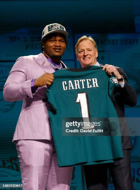 Jalen Carter poses with NFL Commissioner Roger Goodell after being selected ninth overall by the Philadelphia Eagles during the first round of the...