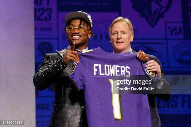 Zay Flowers poses with NFL Commissioner Roger Goodell after being selected 22nd overall by the Baltimore Ravens during the first round of the 2023...