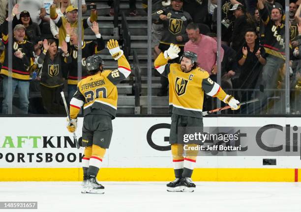 Chandler Stephenson of the Vegas Golden Knights celebrates with teammates after a goal during the second period against the Winnipeg Jets in Game...