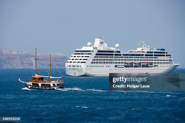 sailboat and cruiseship royal princess. - princess cruises stock pictures, royalty-free photos & images