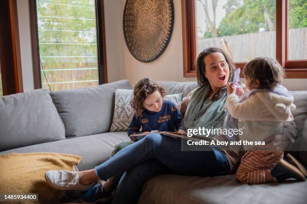 family evening in - australian family time stockfoto's en -beelden