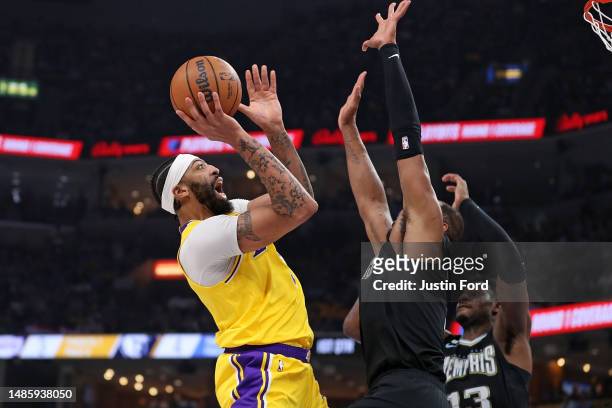 Anthony Davis of the Los Angeles Lakers goes to the basket against Xavier Tillman of the Memphis Grizzlies during Game Two of the Western Conference...