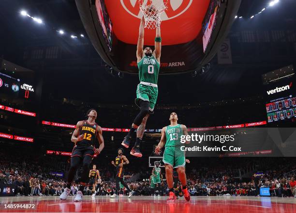 Jayson Tatum of the Boston Celtics dunks against the Atlanta Hawks during the second quarter of Game Six of the Eastern Conference First Round...