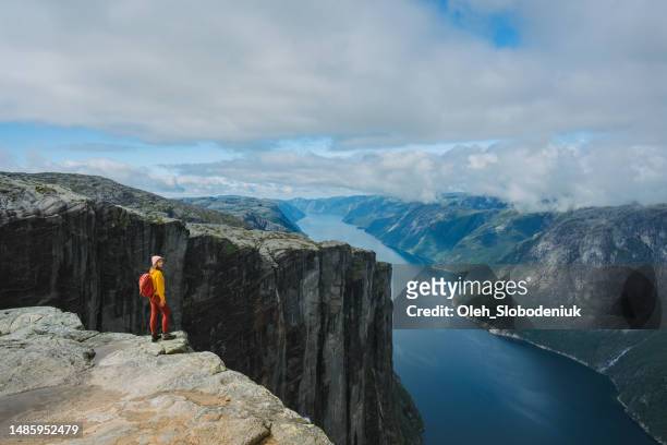 hiking norway - mountain peak path stock pictures, royalty-free photos & images