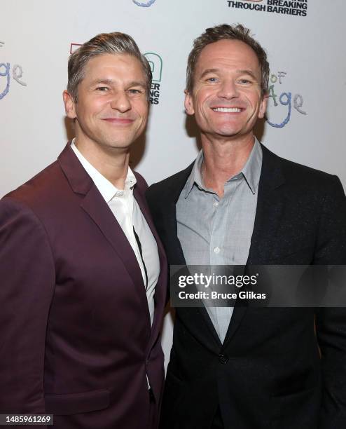 David Burtka and Neil Patrick Harrs pose at the opening night of Theater Breaking through Barriers production of "God of Carnage" at Theater Five at...