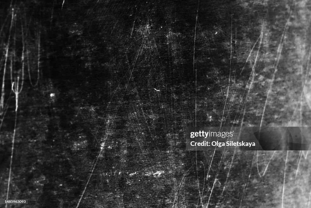 Noise, damage and scratches on a black background