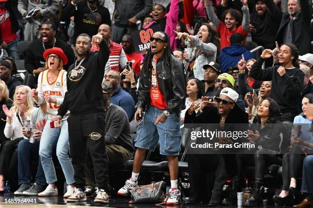 Quavo and The-Dream attend Game Six of the Eastern Conference First Round Playoffs between the Atlanta Hawks and the Boston Celtics at State Farm...