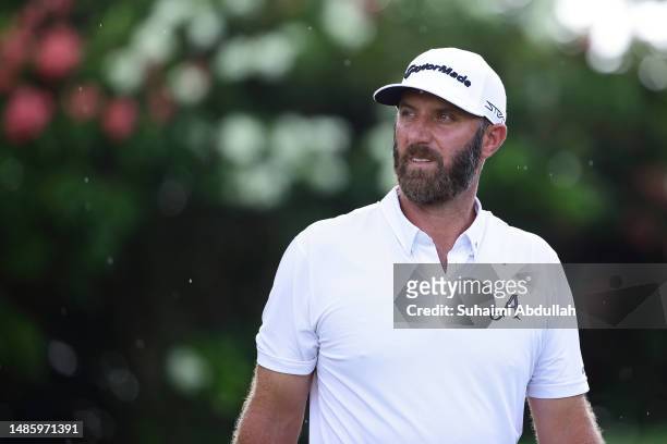 Dustin Johnson of 4Aces GC in action during day one of the LIV Golf Invitational - Singapore at Sentosa Golf Club on April 28, 2023 in Singapore.