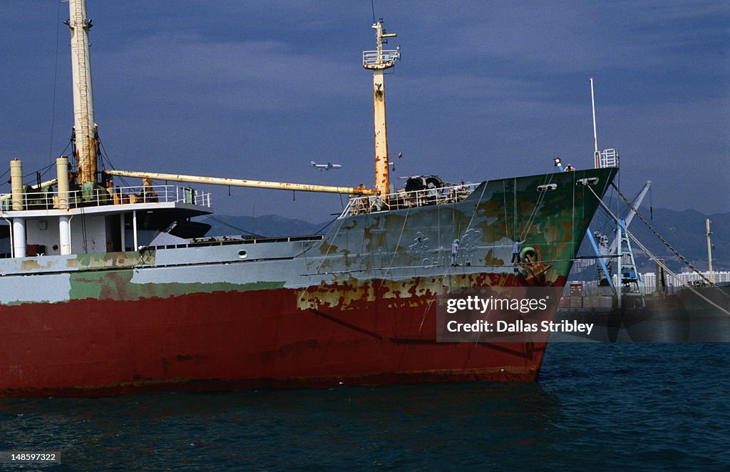 Section of ship in harbour.