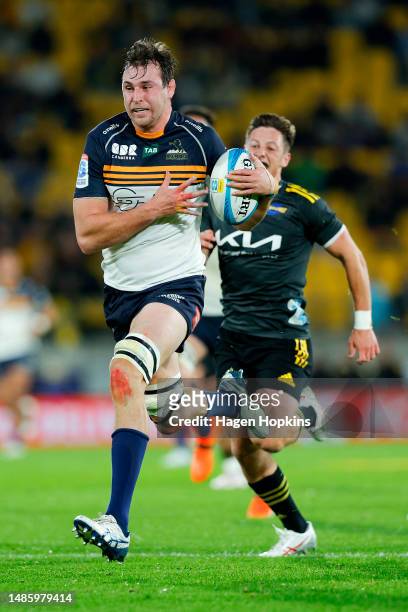 Nick Frost of the Brumbies breaks away for a try during the round 10 Super Rugby Pacific match between Hurricanes and ACT Brumbies at Sky Stadium, on...