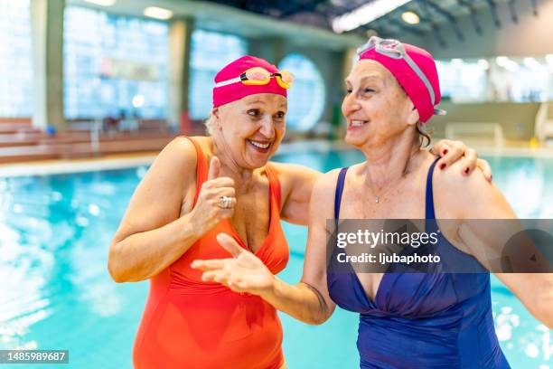 senior friends having fun at swimming pool. - 80 plus years stock pictures, royalty-free photos & images