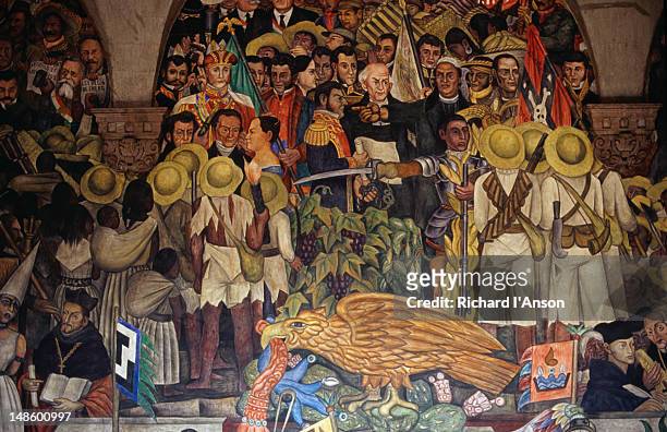 murals by diego rivera in the national palace, the 120 frescos were painted by rivera and his assitants in the 1920's - diego rivera fotografías e imágenes de stock