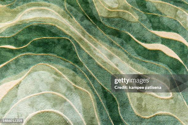 full frame shot of green rug carpet pattern texutre background - plastic animals stock pictures, royalty-free photos & images