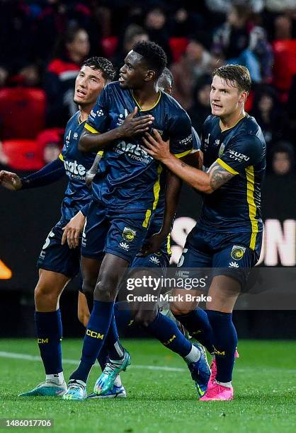Bèni Nikololo of the Mariners celebrates after scoring his teams second goal during the round 26 A-League Men's match between Adelaide United and...