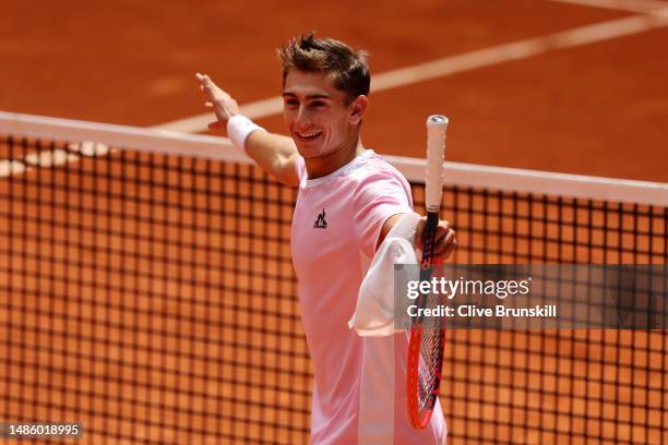 Matteo Arnaldi of Italy celebrates winning match point against Casper Ruud of Norway during the Men's Singles second round match on Day Five of the...