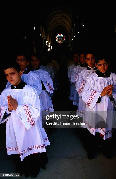 christmas procession of altar boys at st catherine's church. - palestinian boy stock pictures, royalty-free photos & images