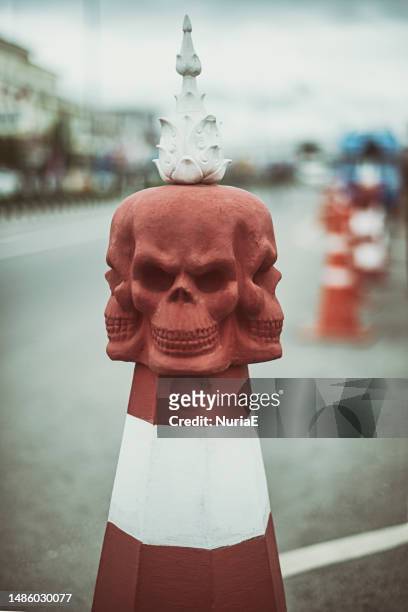 traffic cone in the shape of a skull, chiang rai, thailand - wat rong khun stock pictures, royalty-free photos & images