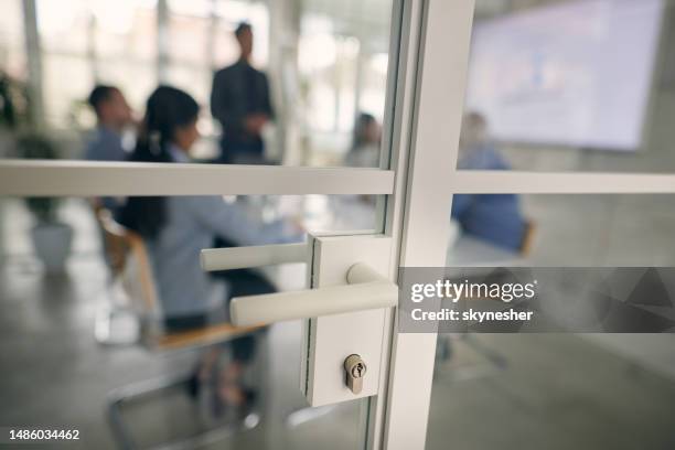 close up of glass door of an office. - door knob stock pictures, royalty-free photos & images