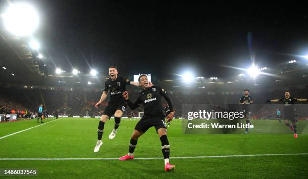 Marcus Tavernier of AFC Bournemouth celebrates with teammates after scoring the team's first goal during the Premier League match between Southampton...