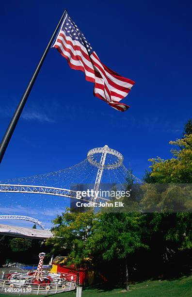 an american flag still flies at the us pavilion in riverfront park, home of the 1974 world's fair. - riverfront park spokane stock-fotos und bilder