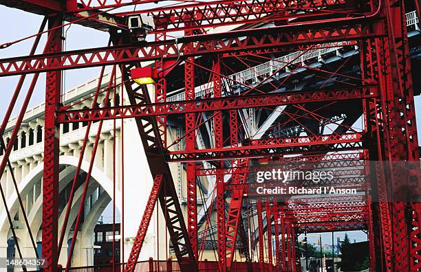 detail of bridges in the flats district. - cleveland ohio flats stock pictures, royalty-free photos & images