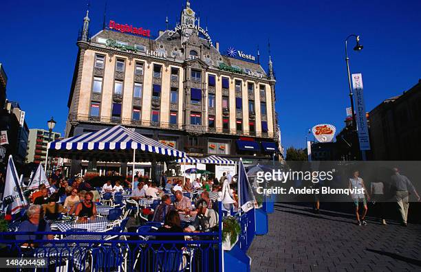 an outdoor cafe in the square on karl johan street - oslo city life stock pictures, royalty-free photos & images