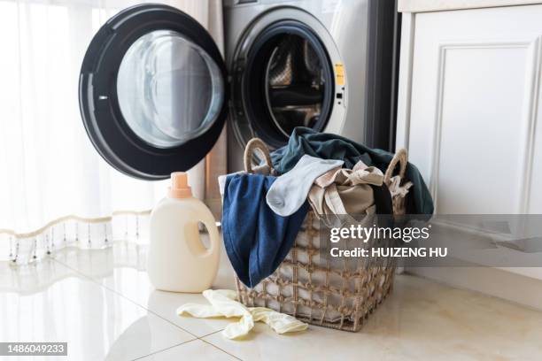 basket with laundry and washing machine - lavatrice foto e immagini stock