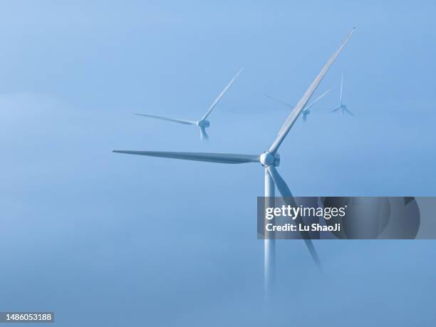 offshore wind farm in the sea. - structure actionnée par le vent photos et images de collection