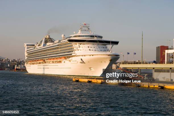 p&o cruise ship grand princess departing piraeus harbour. - grand princess cruise ship stock pictures, royalty-free photos & images