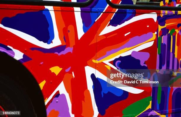 colourful image of union jack on sightseeing bus. - european union abstract stock-fotos und bilder