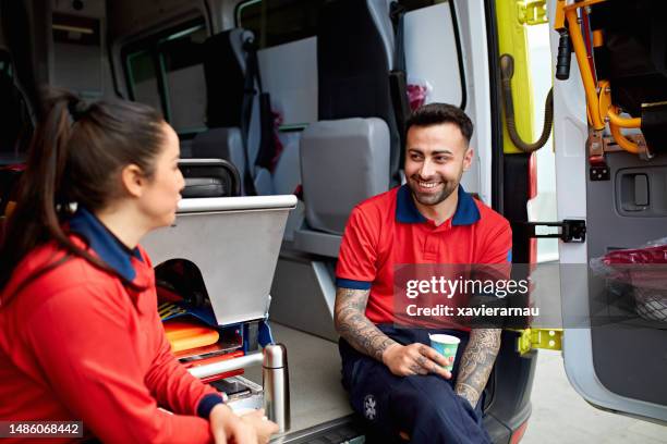 paramedic team taking a break - lunch break stock pictures, royalty-free photos & images