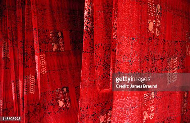 batik fabric for sale in a georgetown shop. - malaysia batik stock pictures, royalty-free photos & images