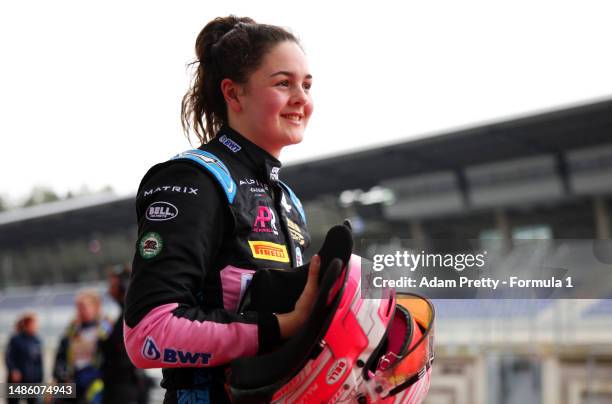 Abbi Pulling of Great Britain and Rodin Carlin celebrates in parc ferme after winning pole position in Qualifying 1 and 2 prior to the F1 Academy...