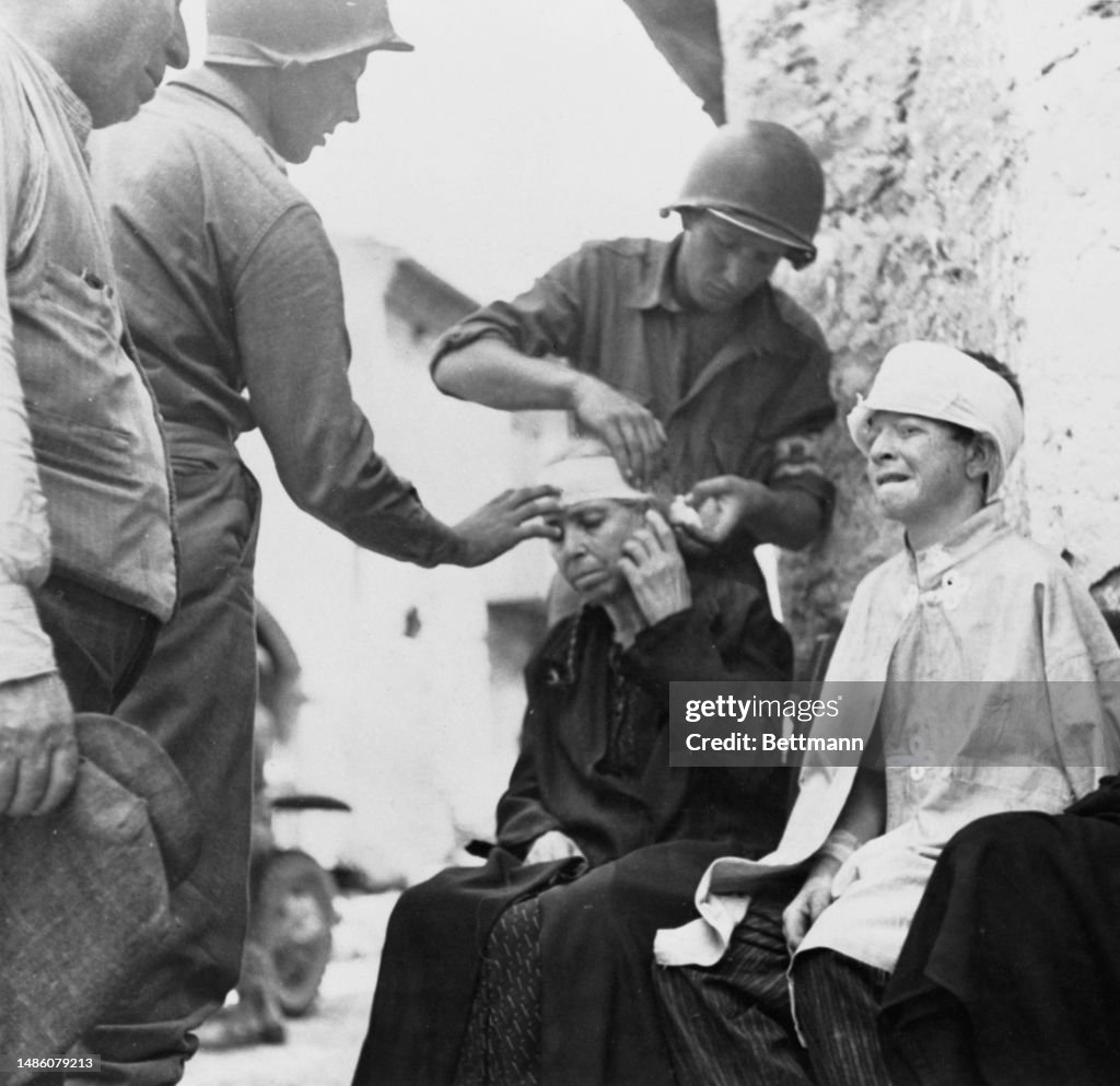 US Soldiers Treating Italian Civilians