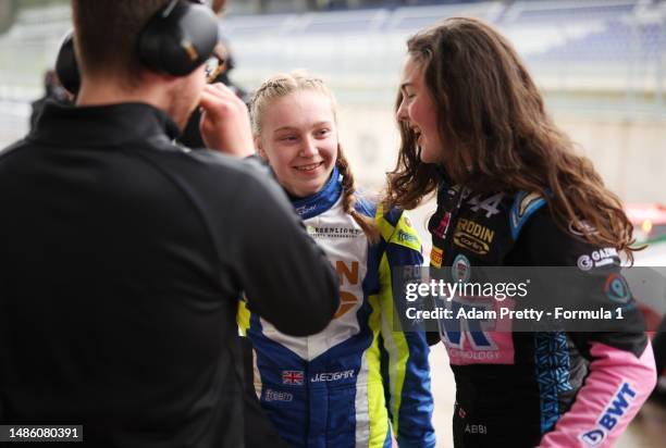 Jessica Edgar of Great Britain and Rodin Carlin speaks to teammate Abbi Pulling of Great Britain and Rodin Carlin in parc ferme during qualifying...