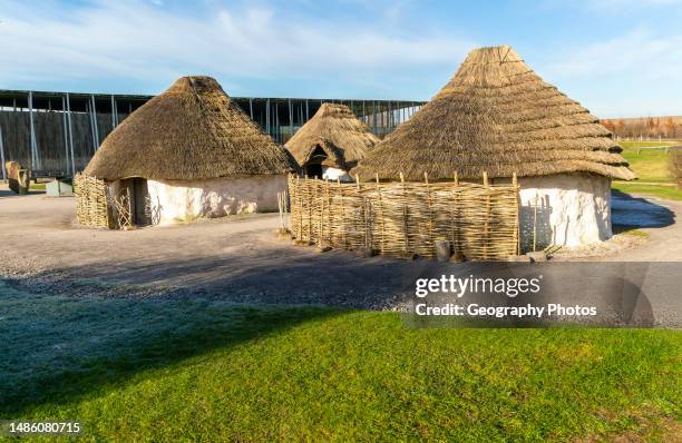 Reconstruction of Neolithic round houses buildings, Stonehenge, Wiltshire, England, UK.