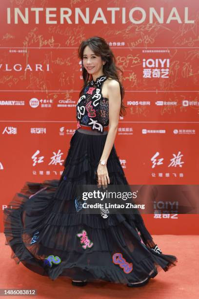Singer and actress Karen Mok arrives at closing ceremony red carpet for the 2023 Beijing International Film Festival at Yanqi Lake International...