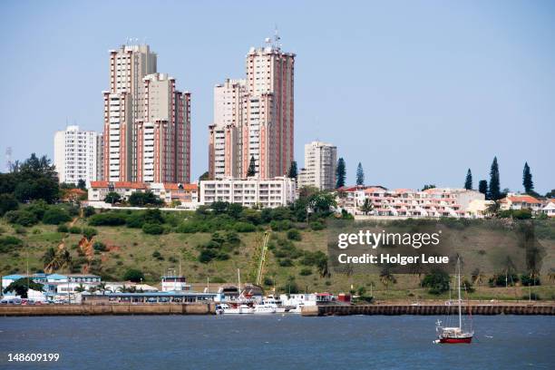 high-rise buildings seen from harbour. - maputo stock pictures, royalty-free photos & images